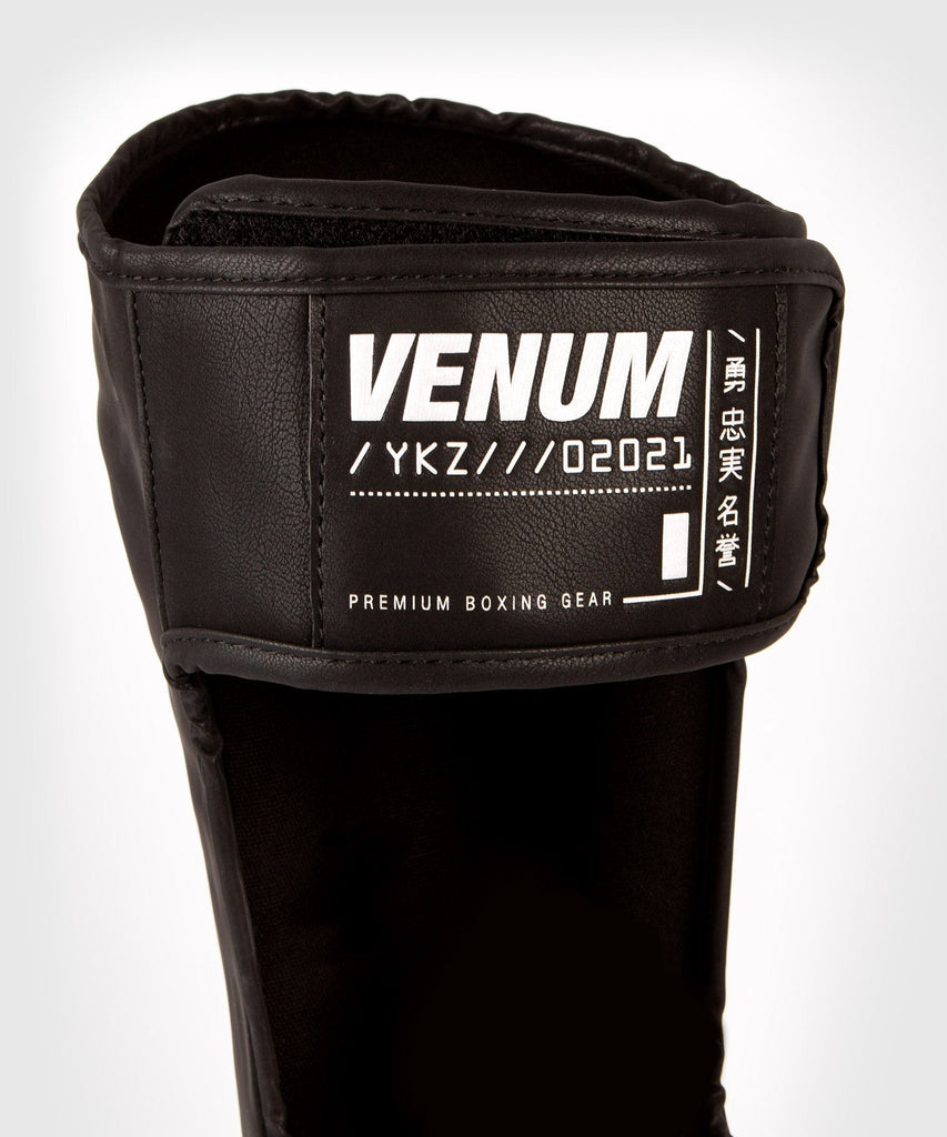 Venum YKZ21 Shin Guards - For Kids - Black/White - mmafightshop.ae